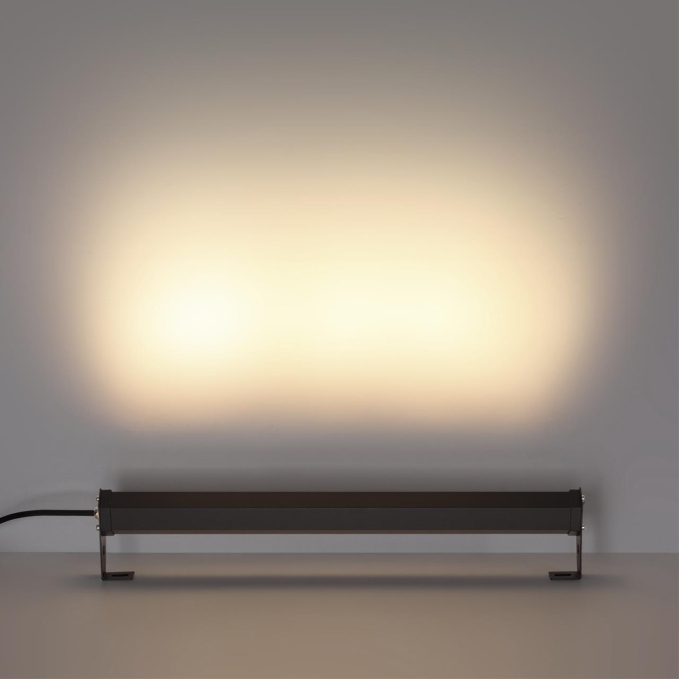 Фасадный поворотный на 180° светильник IP65 LED 14W 3000K 24° 759Лм AC220-240V GRAZE NATURE ODL25 679 ODEON LIGHT 7040/10WL, фото на цветном фоне 1 Фасадный поворотный на 180° светильник IP65 LED 14W 3000K 24° 759Лм AC220-240V GRAZE NATURE ODL25 679 ODEON LIGHT 7040/10WL, фото на цветном фоне 1